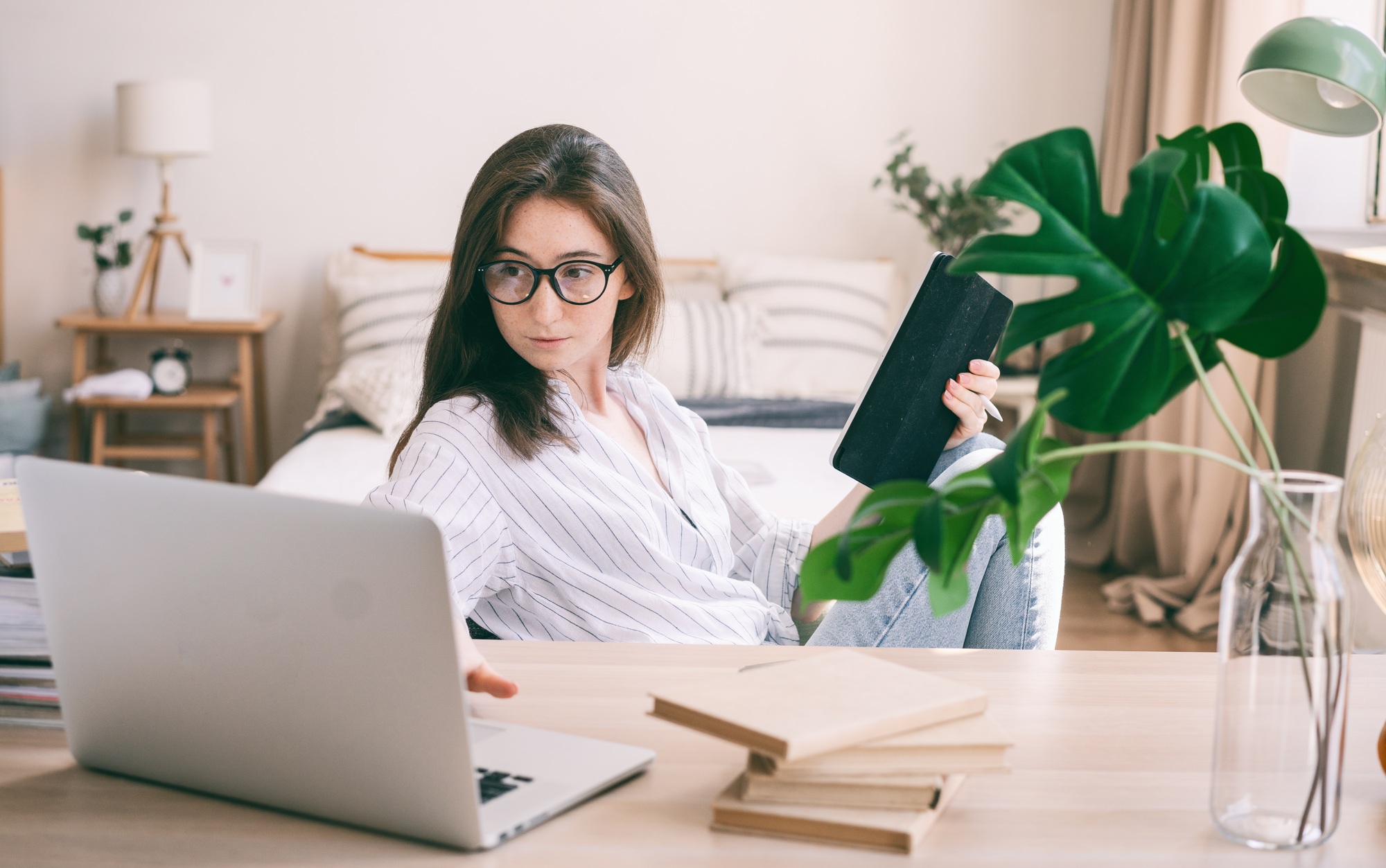 Young beautiful woman using laptop